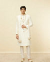 alt message - Manyavar Men Pearled Ivory White Bel Buti Patterned Sherwani Set image number 2