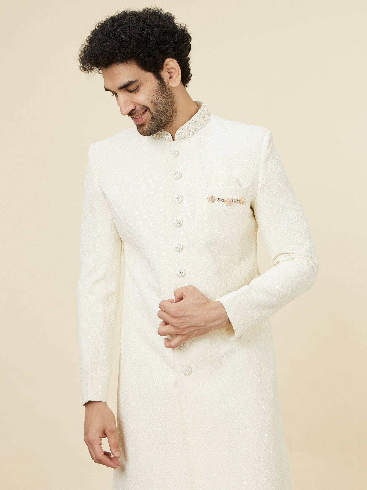 alt message - Manyavar Men Antique White Floral Patterned Sequined Sherwani Set image number 0