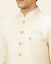 alt message - Manyavar Men Golden Cream Buta Patterned Achkan Style Sherwani Set image number 1