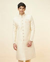 alt message - Manyavar Men Golden Cream Buta Patterned Achkan Style Sherwani Set image number 0