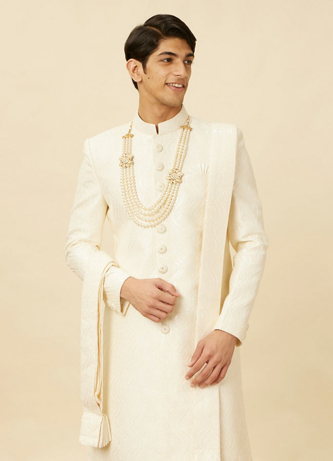 alt message - Manyavar Men Lush Cream Sequinned Sherwani Set image number 0