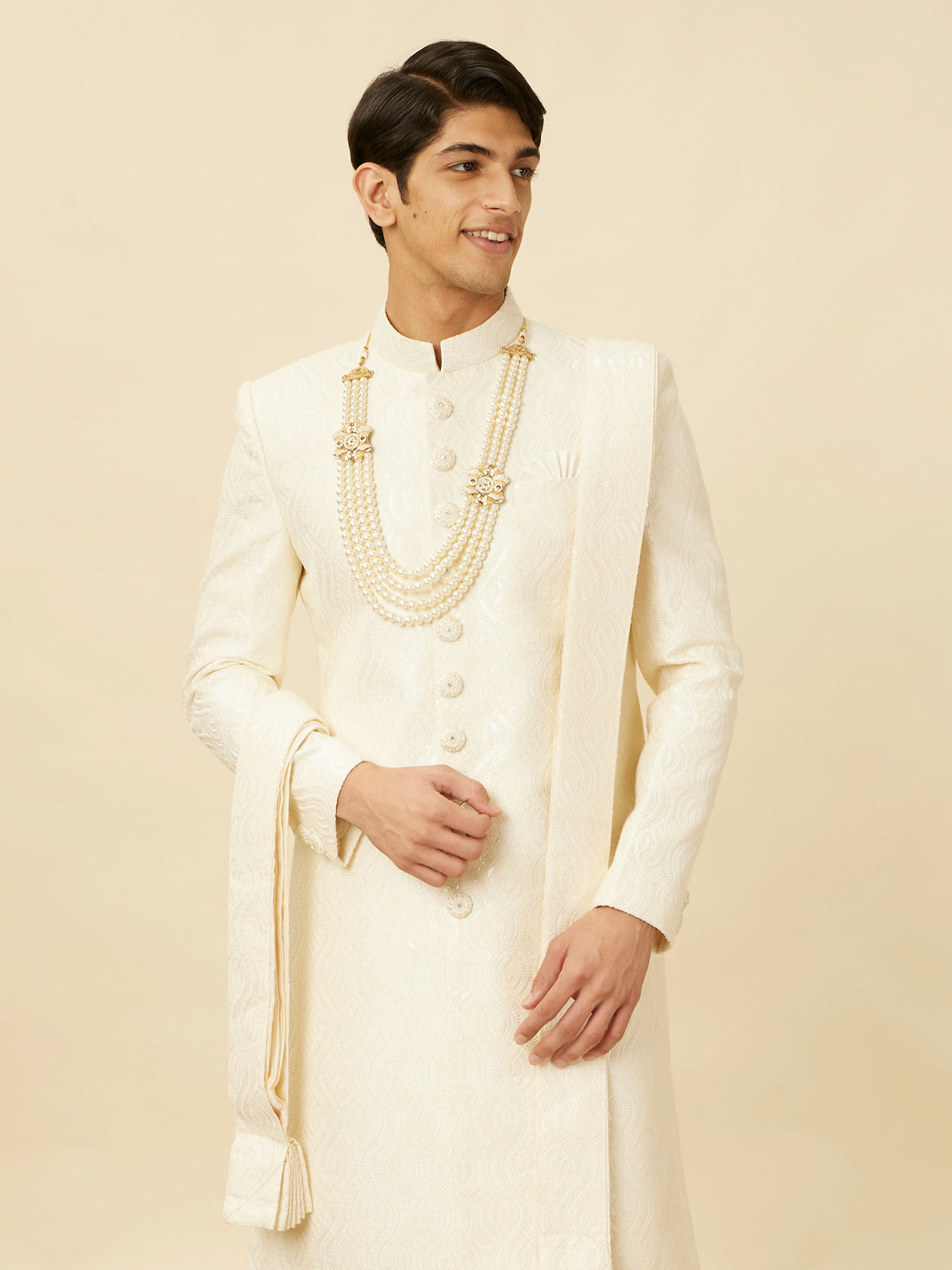 alt message - Manyavar Men Lush Cream Sequinned Sherwani Set image number 0