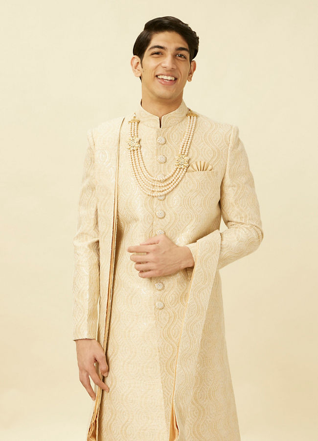 alt message - Manyavar Men Antique White Overlapping Wave Patterned Sherwani Set image number 0