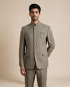 Manyavar Men Green Blended Rayon Jodhpuri Suit with Pocket Square