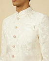 alt message - Manyavar Men Pristine White Medallion Patterned Sherwani Set image number 1