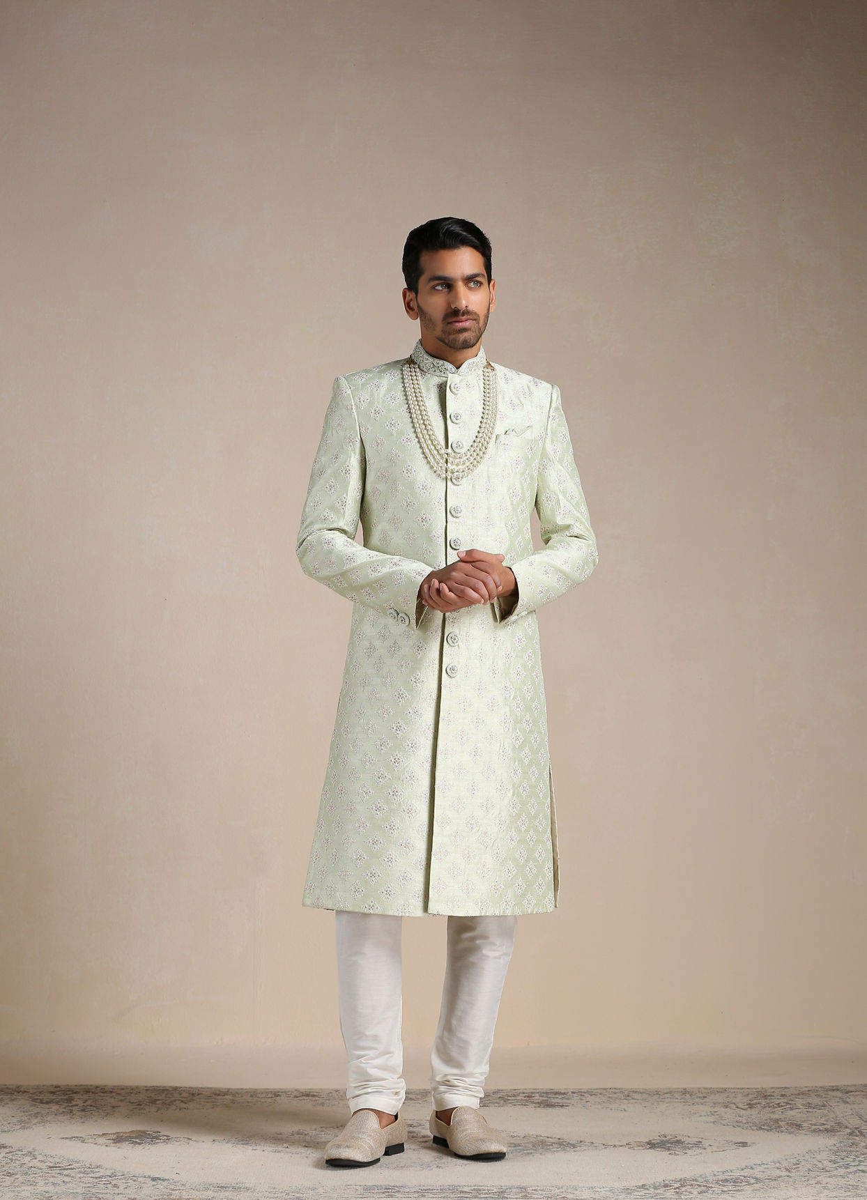 alt message - Manyavar Men Mint Green Floral Patterned Sherwani Set image number 0