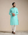 alt message - Manyavar Men Turquoise Green Mandarin Collared Kurta Set image number 1