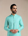 alt message - Manyavar Men Turquoise Green Mandarin Collared Kurta Set image number 0