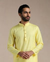 alt message - Manyavar Men Crayola Yellow Self Patterned Kurta Set image number 0