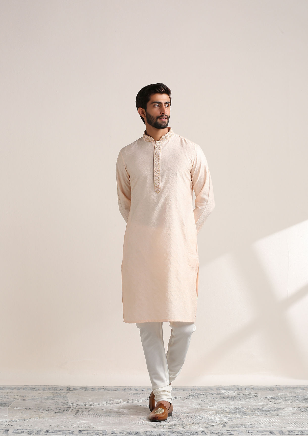 alt message - Twamev Men Cream Pink Embroidered Neck Kurta Set image number 1