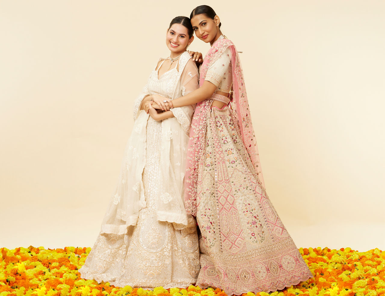 Bridesmaids Wearing White and Pastel Colour Lehenga