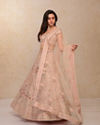 alt message - Mohey Women Blush Pink Embellished Lehenga image number 1