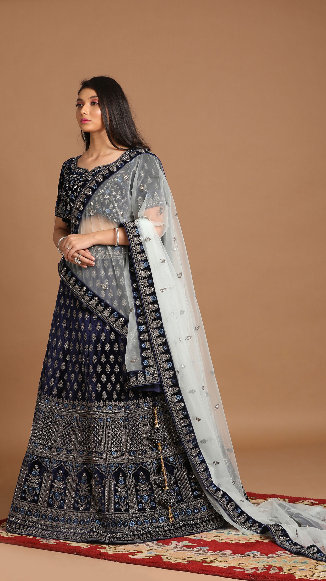 alt message - Mohey Women Indigo Blue Velvet Lehenga image number 2