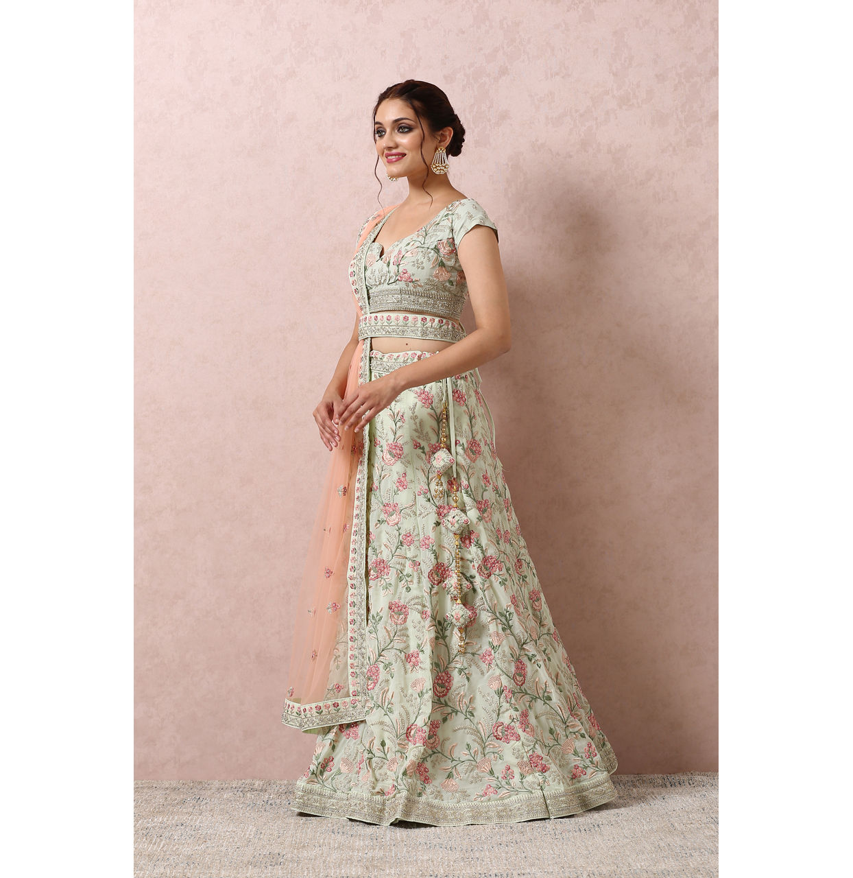 alt message - Mohey Women Pista Green Bridal Floral Lehenga image number 2