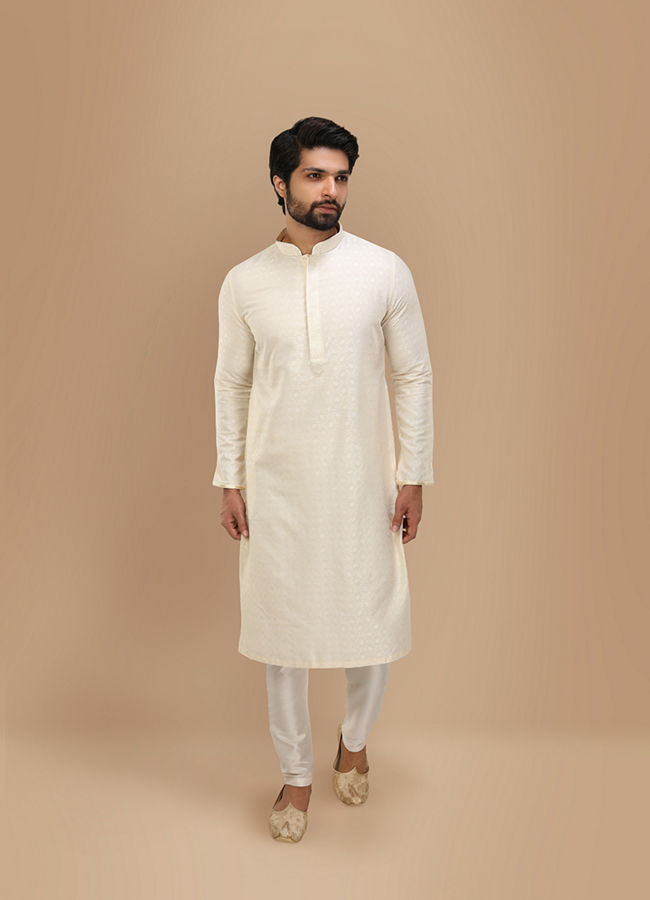 alt message - Manyavar Men Off White Self Embossed Kurta Set image number 1