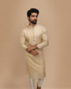 alt message - Manyavar Men Beige Self Motif Kurta Set image number 1