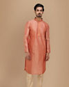 alt message - Manyavar Men Deep Coral Self Motif Kurta Set image number 1