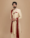 alt message - Manyavar Men Beige Sherwani Suit With Bold Zardozi Work image number 2