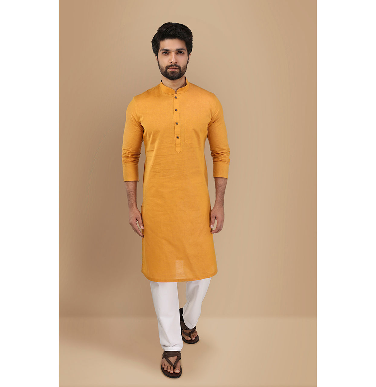 alt message - Manyavar Men Mustard Yellow Solid Kurta image number 1