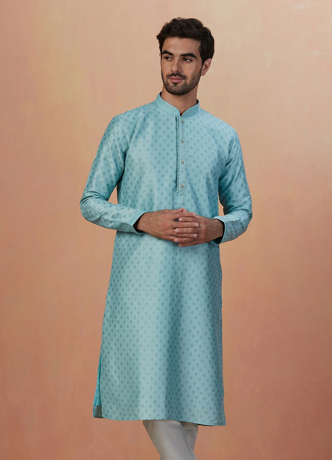 alt message - Manyavar Men Sea Green Kurta Pajama With Golden Motifs image number 1