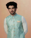 alt message - Manyavar Men Teal Jacket With Golden Motifs image number 0