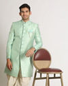 alt message - Manyavar Men Grandiose Green Indo Western Set image number 1