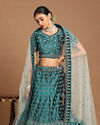 alt message - Mohey Women Sea Green Velvet Lehenga image number 0