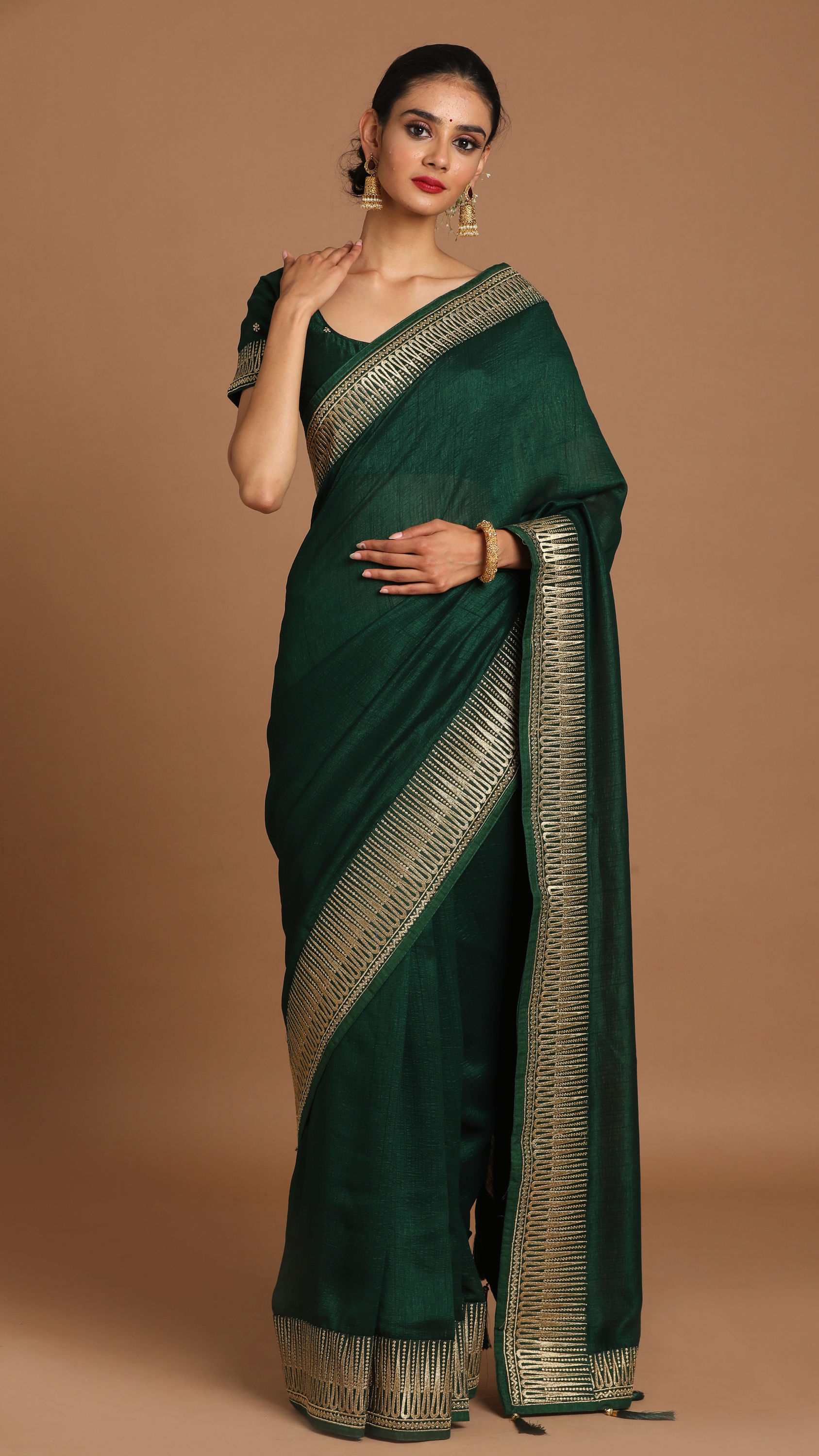 Mohey Women Bodacious Bottle Green Saree