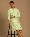 alt message - Manyavar Men Light Green Kurta Set With Golden Booti image number 1