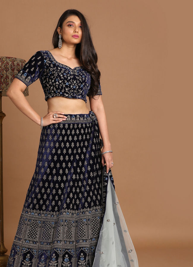 alt message - Mohey Women Indigo Blue Velvet Lehenga image number 0