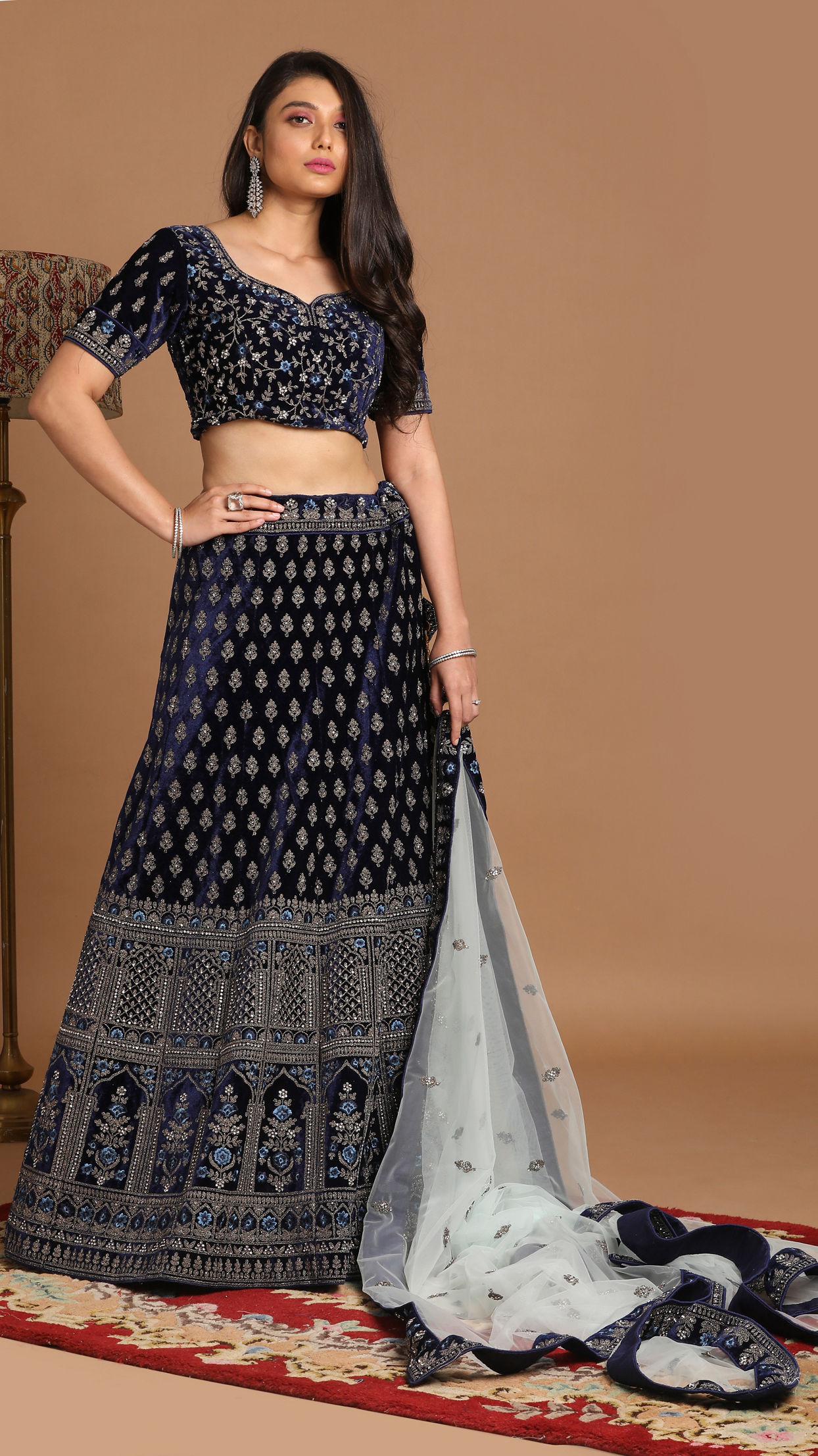 alt message - Mohey Women Indigo Blue Velvet Lehenga image number 0