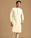 alt message - Manyavar Men Classy Cream Kurta Set image number 1