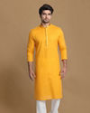 Manyavar Men Mustard Yellow Solid Kurta Pajama image number 1