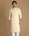 alt message - Manyavar Men Cream Printed Kurta Set image number 1