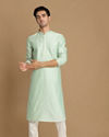 alt message - Manyavar Men Pastel Green Embroidered Kurta Set image number 1