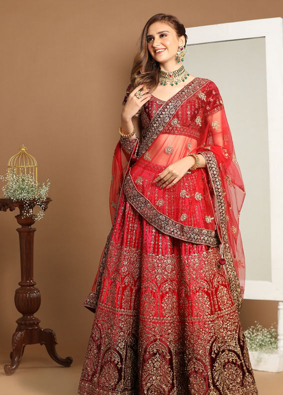 Mohey Women Rani And Maroon Velvet Zari Embroidered Bridal Lehenga