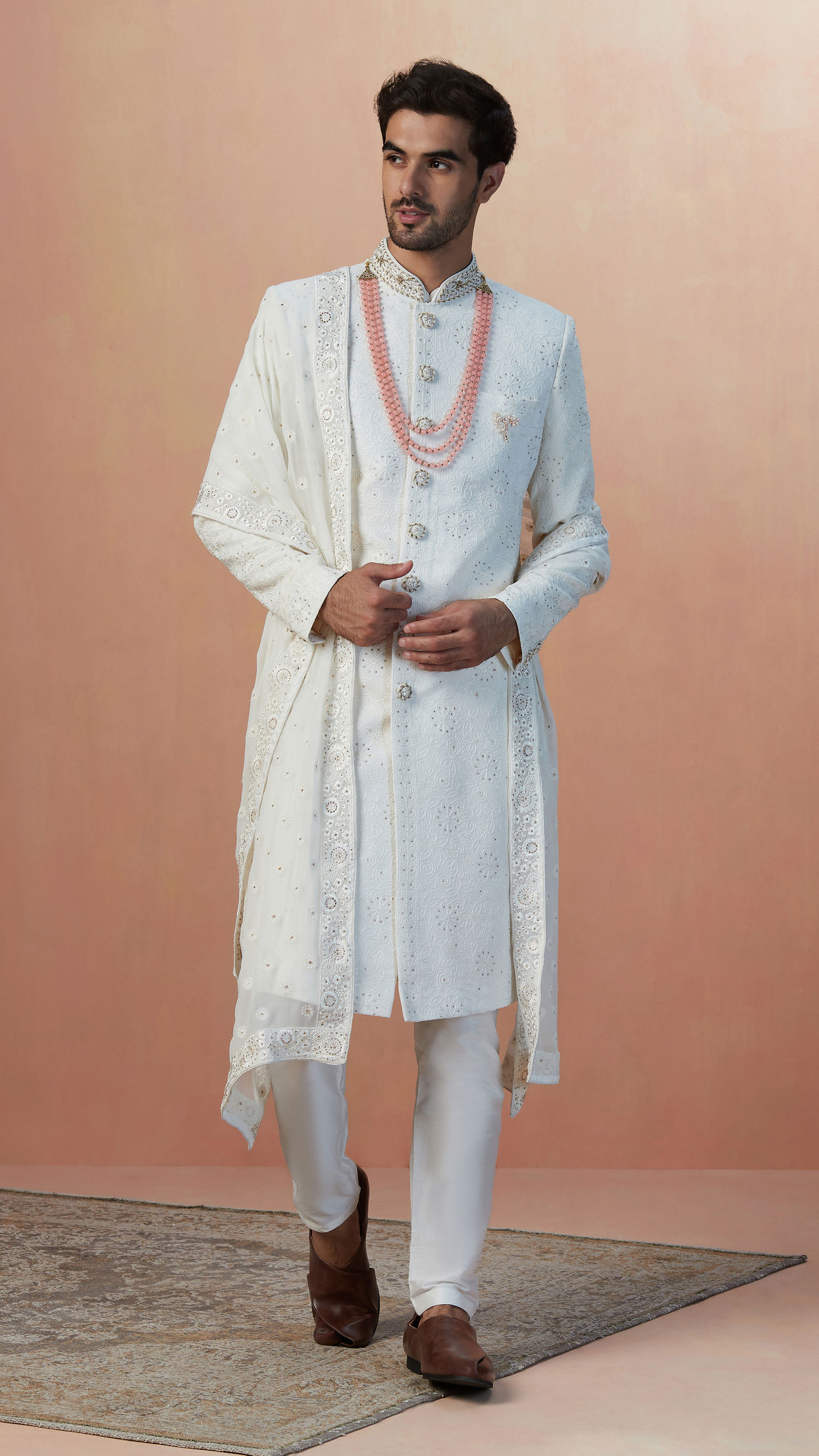 alt message - Manyavar Men Pearl White Chikankari Sherwani With Dupatta image number 1