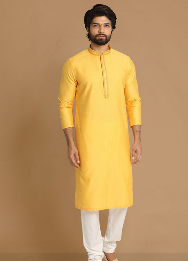 alt message - Manyavar Men Daffodil Yellow Solid Kurta Pajama image number 1