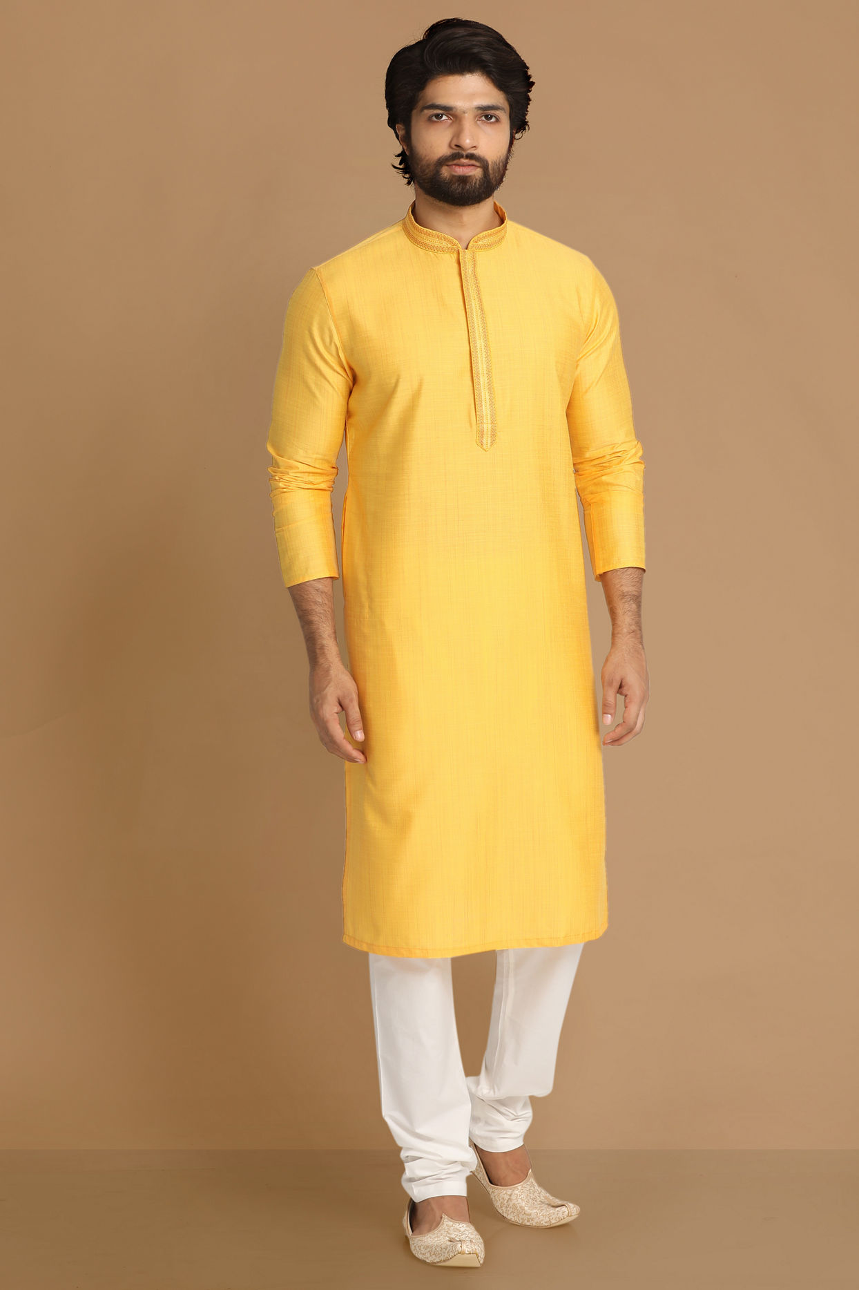 alt message - Manyavar Men Daffodil Yellow Solid Kurta Pajama image number 1