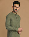 alt message - Manyavar Men Textured Green Kurta image number 0