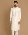 alt message - Manyavar Men Beige Brocade Sherwani Set image number 1