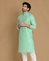 alt message - Manyavar Men Plush Light Green Kurta Pajama image number 1