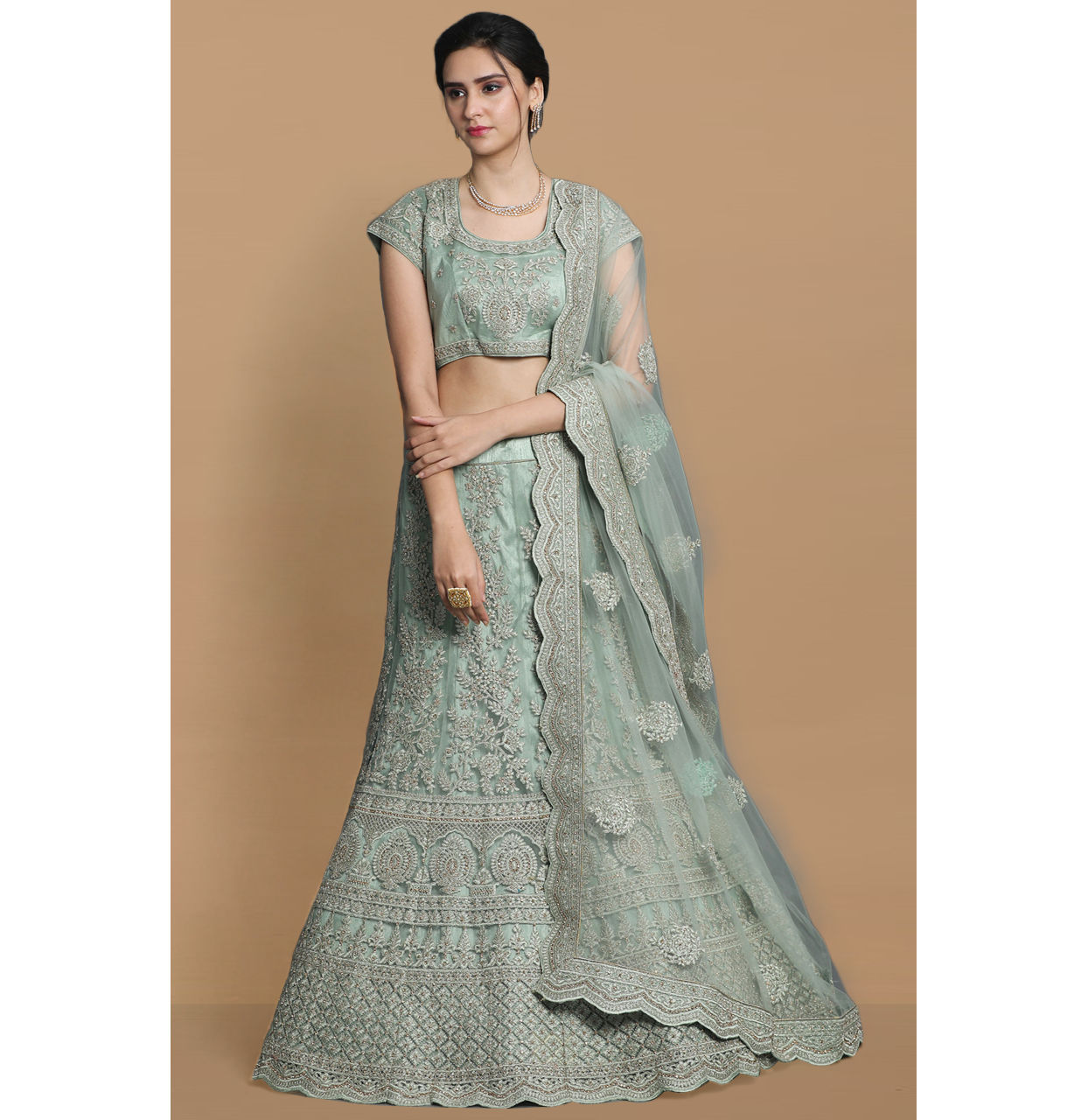 alt message - Mohey Women Pista Net Embroidered Lehenga image number 0