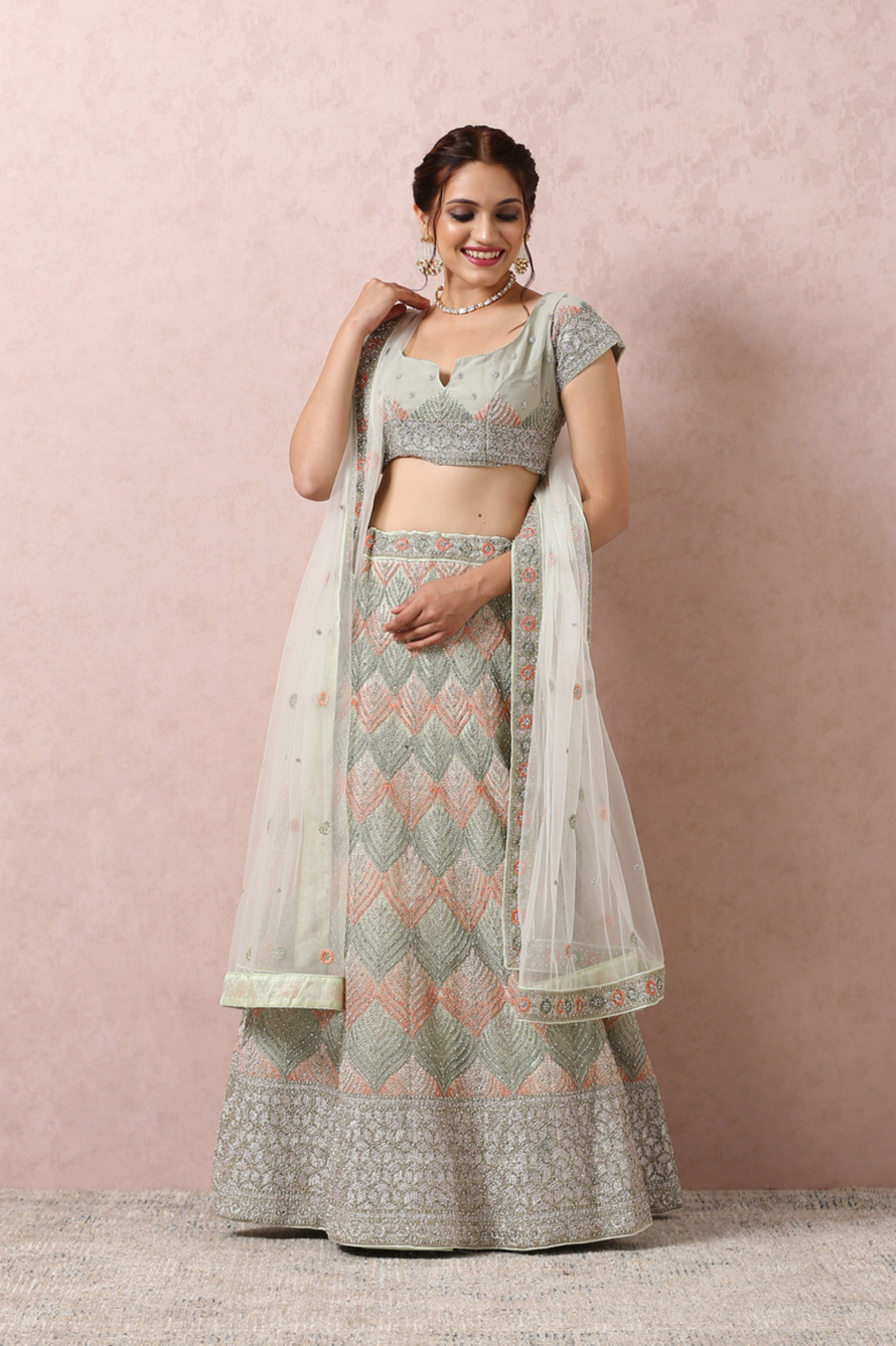 Mohey Women Light Pista Embellished Bridal Lehenga