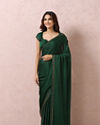 alt message - Mohey Women Bottle Green Satin Saree With Stone Embellishment image number 0