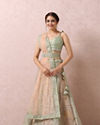 alt message - Mohey Women Pista Embellished Bridal Lehenga image number 0