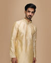 alt message - Manyavar Men Beige Plain Kurta Set image number 0