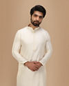 alt message - Manyavar Men Off White Self Embossed Kurta Set image number 0