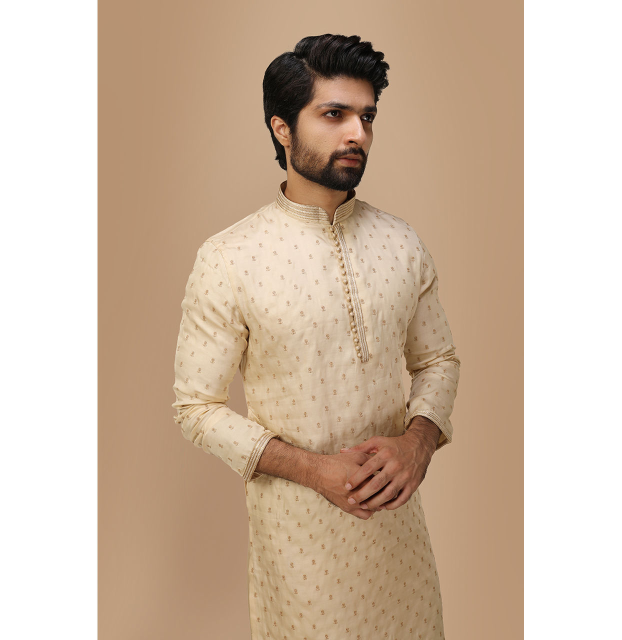 alt message - Manyavar Men Beige Self Motif Kurta Set image number 0