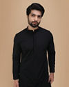 alt message - Manyavar Men Black Self Embroidered Kurta Set image number 0